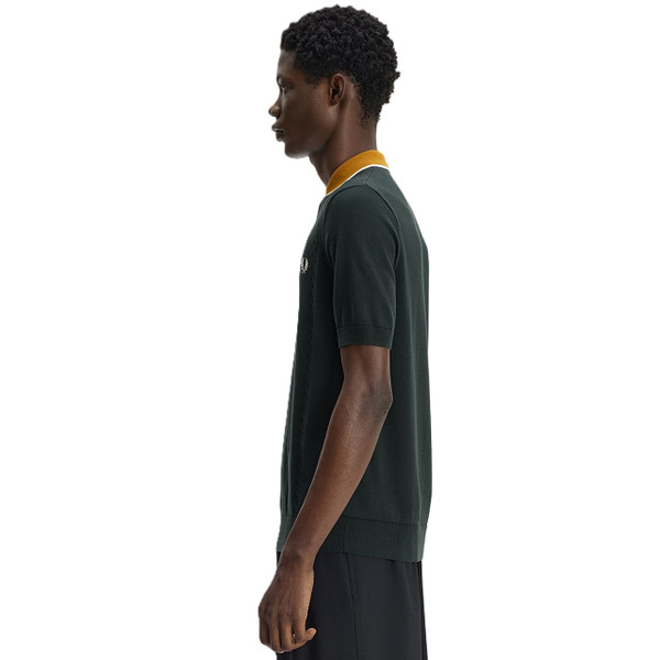 Model Wearing Fred Perry Cable Knit Tipped Polo Shirt in Night Green - Side view