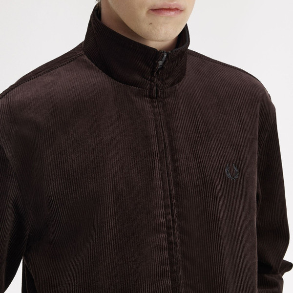 Model Wearing Fred Perry Men's Corduroy Brentham Jacket in Rich Brown - Close up zipped collar