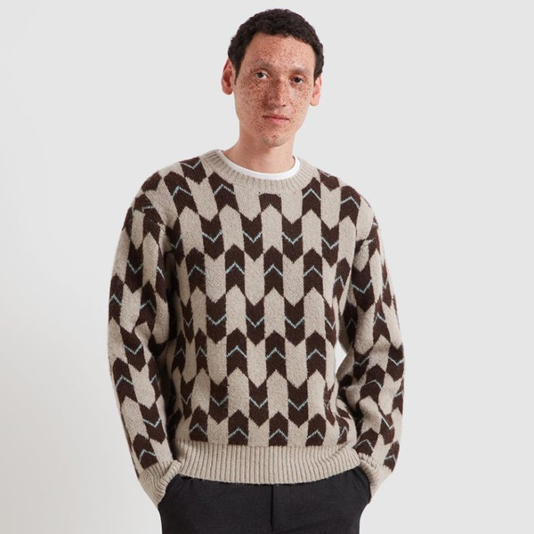 Model Wearing Farah Milt Men's Relaxed FairIsle Geo Jacquard Jumper in Dark Brown - Front facing