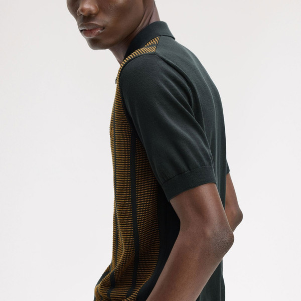 Model Wearing Fred Perry Textured Panel Knitted Zip Neck Polo Shirt in Night Green - Side on