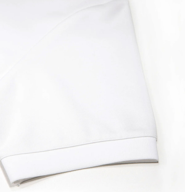 Luke 1977 Throop Zip Neck Polo Shirt in White / Gold - Close up cuff