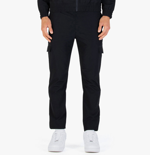 Man wearing Luke 1977 Semantic Pocket Detail Cargo Trousers in Black