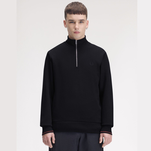Model Wearing Fred Perry Half Zip Funnel Neck Sweatshirt in Navy / Brandy / Rich Brown - Front facing
