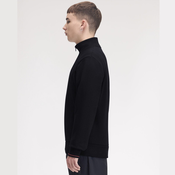 Model Wearing Fred Perry Half Zip Funnel Neck Sweatshirt in Navy / Brandy / Rich Brown - Side on