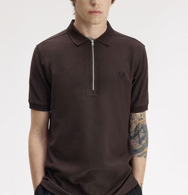 Model wearing Fred Perry Crepe Pique Polo Shirt in Rich Brown - Front facing