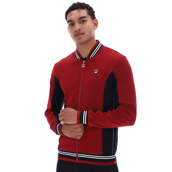 Man wears Fila Vintage Settanta Retro 70s Borg Track Top in Sun Dried Tomato