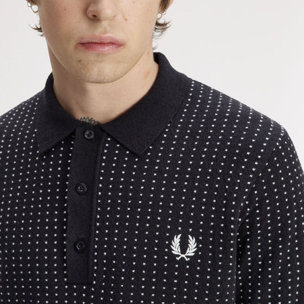 Collar detail on Fred Perry Men's Monochrome Boucle Dot Knitted Polo in Black