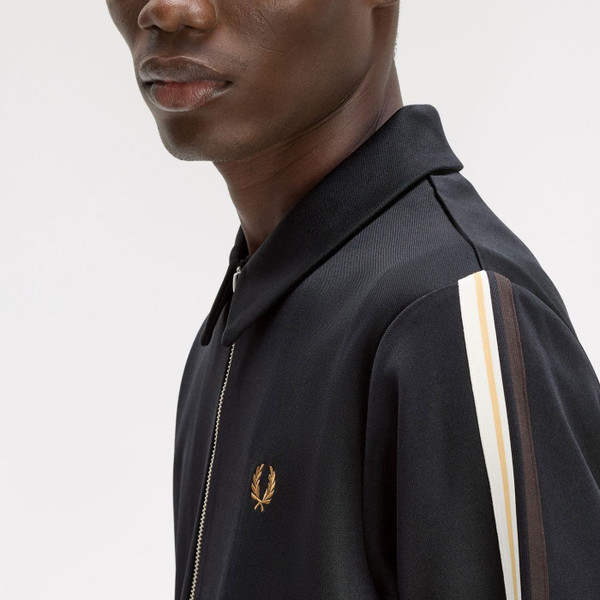 Shoulder and sleeve tape on Fred Perry Men's Tipped Taped Sleeve Track Jacket in Black