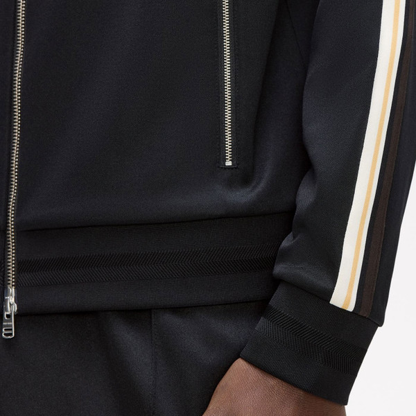 Cuff & Waist tonal banding on Fred Perry Men's Tipped Taped Sleeve Track Jacket in Black