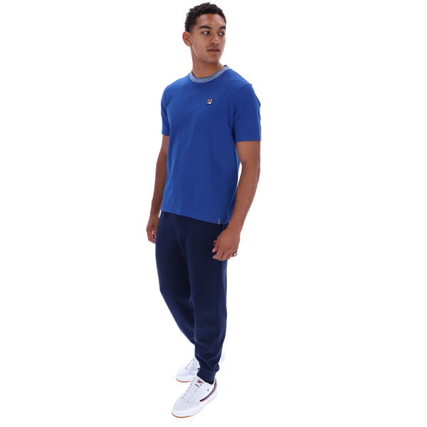 Man wearing Fila Vintage Lance Men's Retro Striped Collar T-Shirt in Mazarine Blue