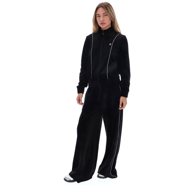 Woman wearing full tracksuit for Fila Vintage Womens Angel Relaxed Wide Leg Velour Joggers in Black