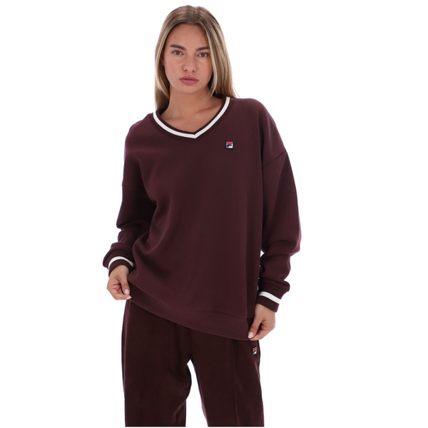 Woman wearing Fila Vintage Womens Grace Oversized V-Neck Sweater in Fudge