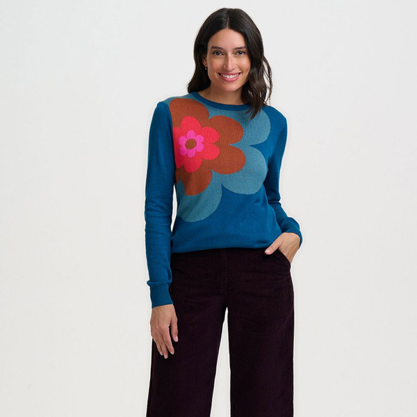 Woman wearing Sugarhill Brighton Rita Retro Growing Flower Jumper in Teal