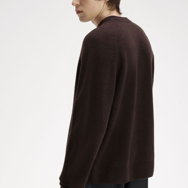 Side back of Fred Perry Men's Merino Wool Saddle Sleeve Jumper in Rich Brown