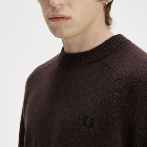 Collar and branding on Fred Perry Men's Merino Wool Saddle Sleeve Jumper in Rich Brown