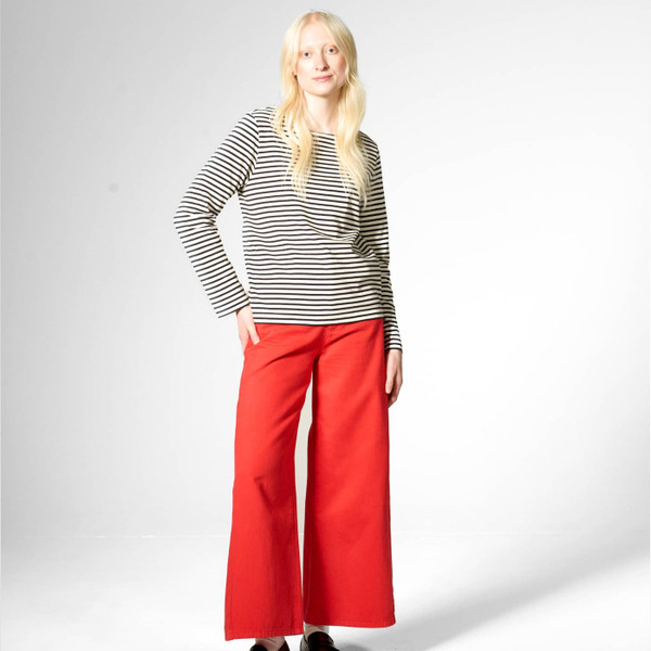 Woman wearing Mademoiselle Yeye Iconique Breton Stripe Long Sleeve Top in White