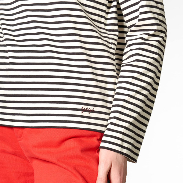 Side hem detail on Mademoiselle Yeye Iconique Breton Stripe Long Sleeve Top in White