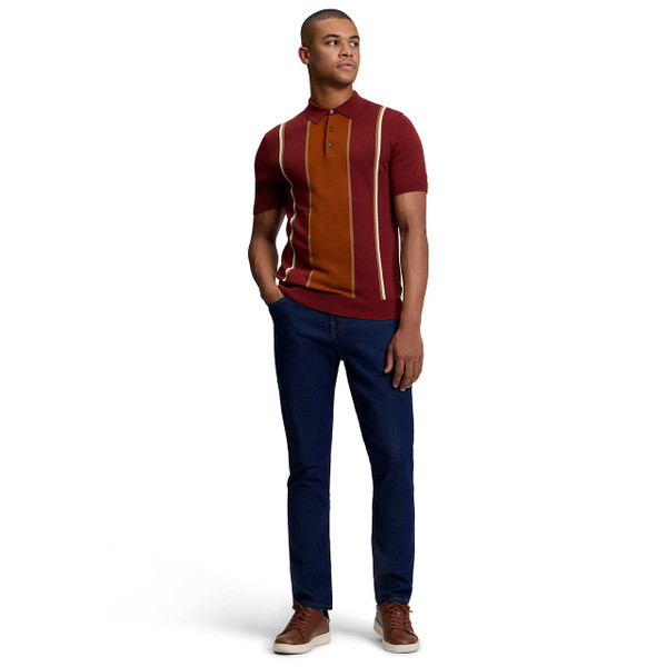 Model Wearing the Ben Sherman Mod Stripe Knitted Polo Shirt Sienna with Jeans