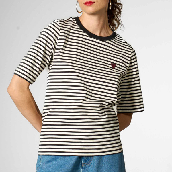 Model wearing Mademoiselle Yeye Everflow Striped Heart T-Shirt in White / Black