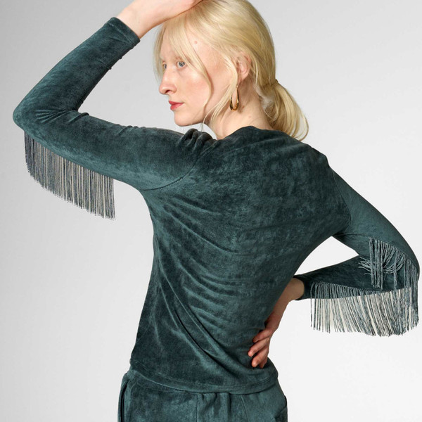 Back tassel sleeves on Mademoiselle YeYe Tassel Heaven Retro 70s Velvet Top in Seaweed Green