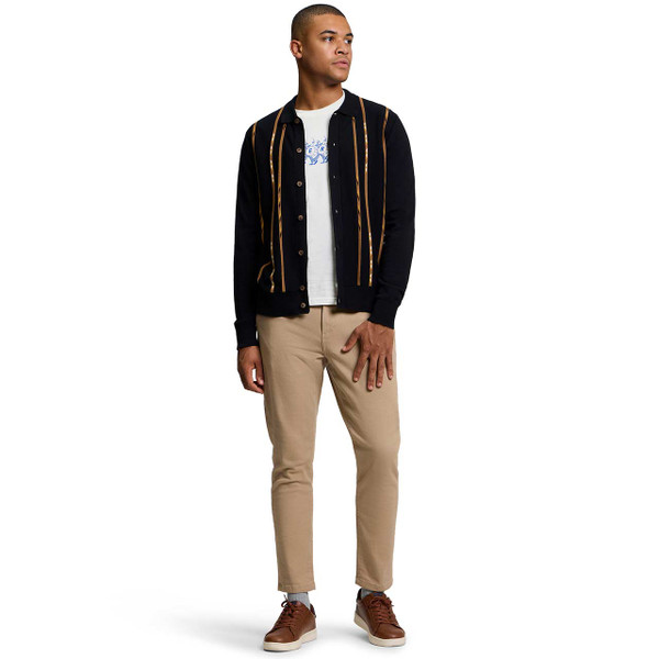 Model Wearing the Ben Sherman Geo Stripe Knitted Polo Cardigan in Black with Chino Trousers