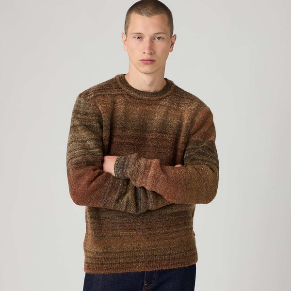 Model Wearing the Levi's Presido Retro 1970s Boucle Jumper Coffee with arms folded