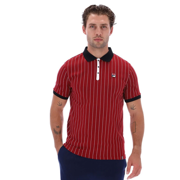 Man wearing Fila Vintage BB1 Pin-Stripe Borg Polo Shirt in Sun Dried Tomato Red