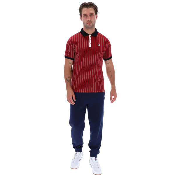 Man wearing Fila Vintage BB1 Pin-Stripe Borg Polo Shirt in Sun Dried Tomato Red