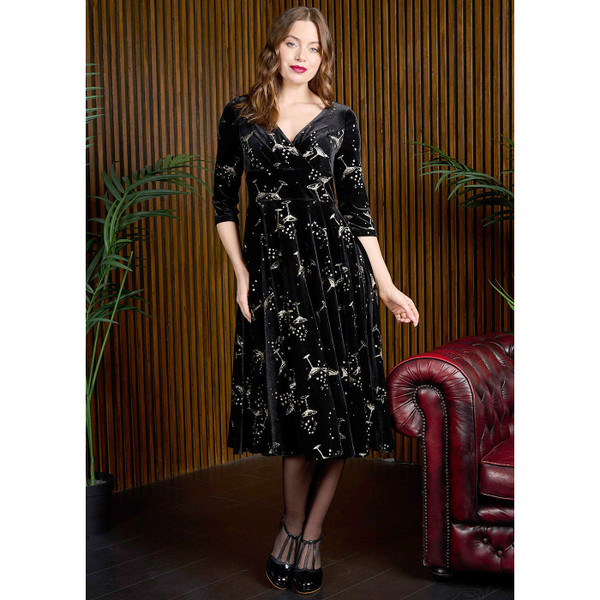 Woman wearing Banned Retro Luna Cheers Vintage Swing Dress in Black
