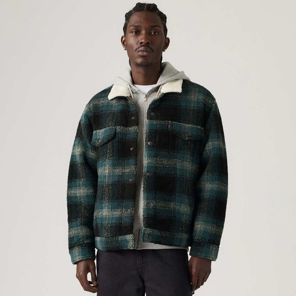 Model Wearing the Levi's Type III Sherpa Trucker Jacket Merle Plaid Frost Gray