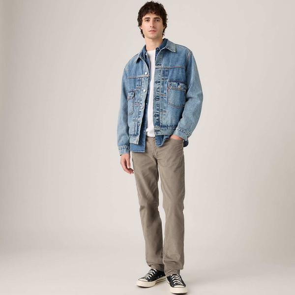Model Wearing the Levi's 511 Slim Corduroy Jeans Smokey Taupe with Denim Jacket