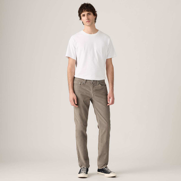 Model Wearing the Levi's 511 Slim Corduroy Jeans Smokey Taupe with White T-shirt