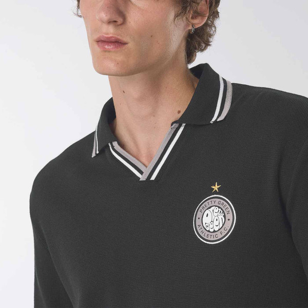 Pretty Green Kingsleigh Waffle Knit Skipper Neck Football Shirt in Black - Close Up on Fabric