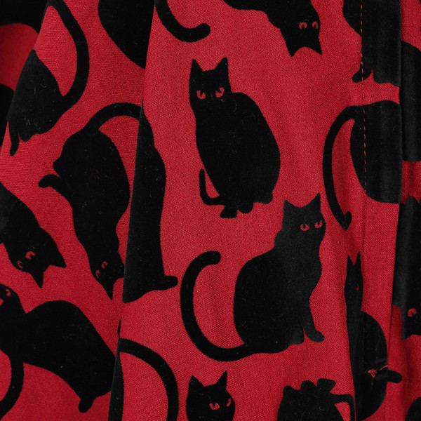 Black cat print on Banned Retro Cecilia Cattitude Flared Suspender Skirt in Red/Black