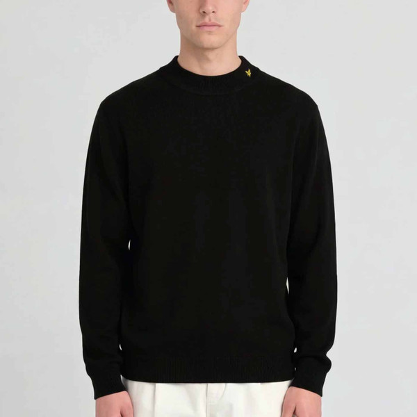 Model Wearing Lyle & Scott Archive Revisited Knitted Turtle Neck Jumper in Jet Black - Front
