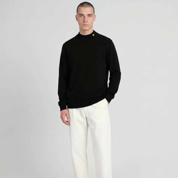 Model Wearing Lyle & Scott Archive Revisited Knitted Turtle Neck Jumper in Jet Black - Front