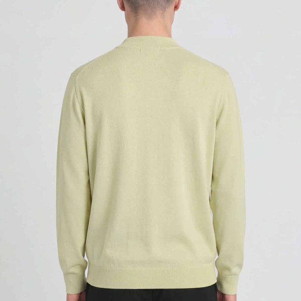 Model Wearing Lyle & Scott Archive Revisited Knitted Turtle Neck Jumper in Muted Ivory - Back