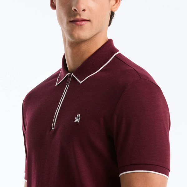 Collar and zip neck on Original Penguin Interlock 1/4 Zip Tipped Polo in Port Royale Red