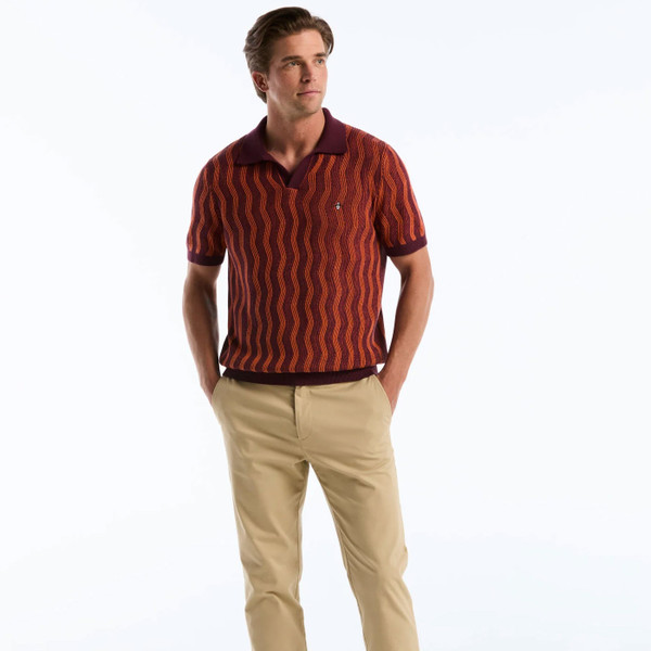 Man wearing Original Penguin Icons Wavy Johnny Collar Knitted Polo in Port Royale Red