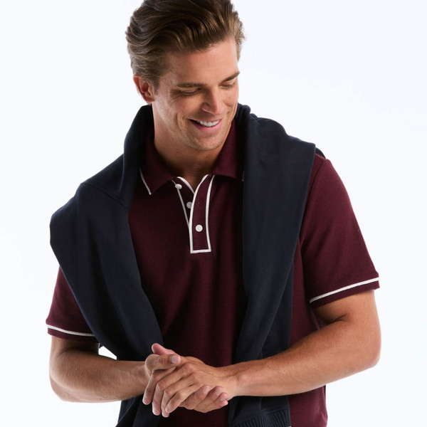Model Wearing Original Penguin Icons Earl Mesh Bentley Polo Shirt in Port Royale - Front
