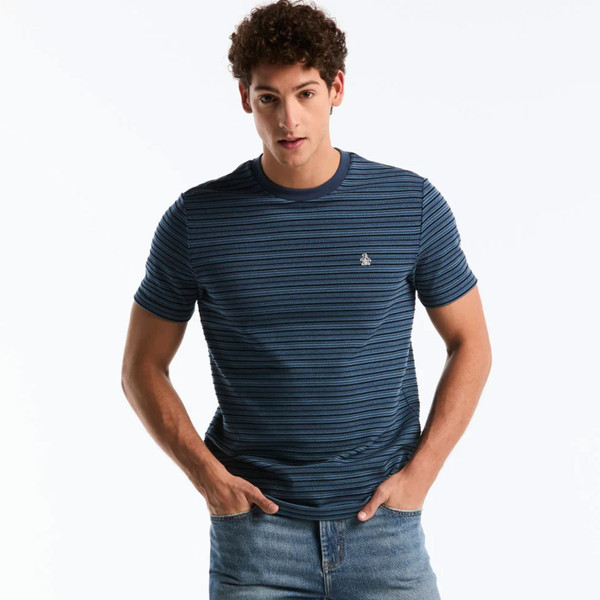 Man wearing Original Penguin Raised Ottoman Stripe T-Shirt in Sargasso Sea blue