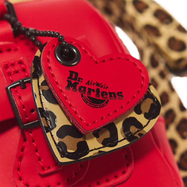 Love heart fobs on Dr Martens Mini Top Handle and Crossbody Kiev Leather Bag in Red
