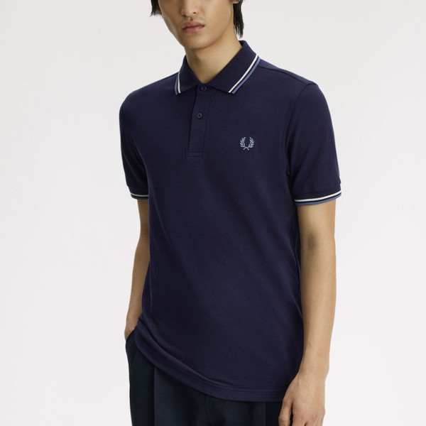 Man wearing Fred Perry M3600 Mod Twin Tipped Polo in Twilight Navy