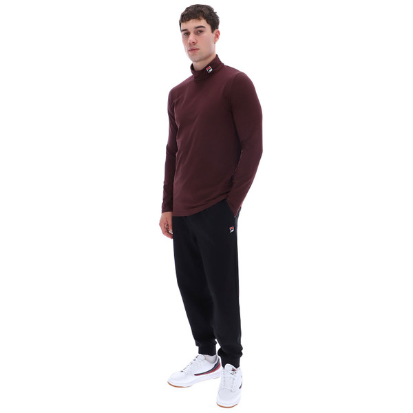 Man wearing Fila Vintage Men's Retro 70s 19th Roll Neck Top in Fudge Brown