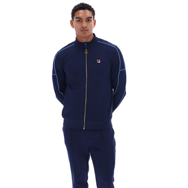 Man wearing Fila Vintage Men's Eldon Retro Piped Track Jacket in Navy