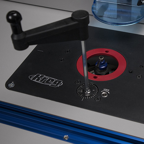 Close-up view of the Kreg Precision Router Lift PRS3000's digital readout and fine adjustment wheel, highlighting its precision control for accurate router bit height settings.