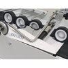 Precision moistening roller and flap feeding plate accurately seal both stacked and nested envelopes