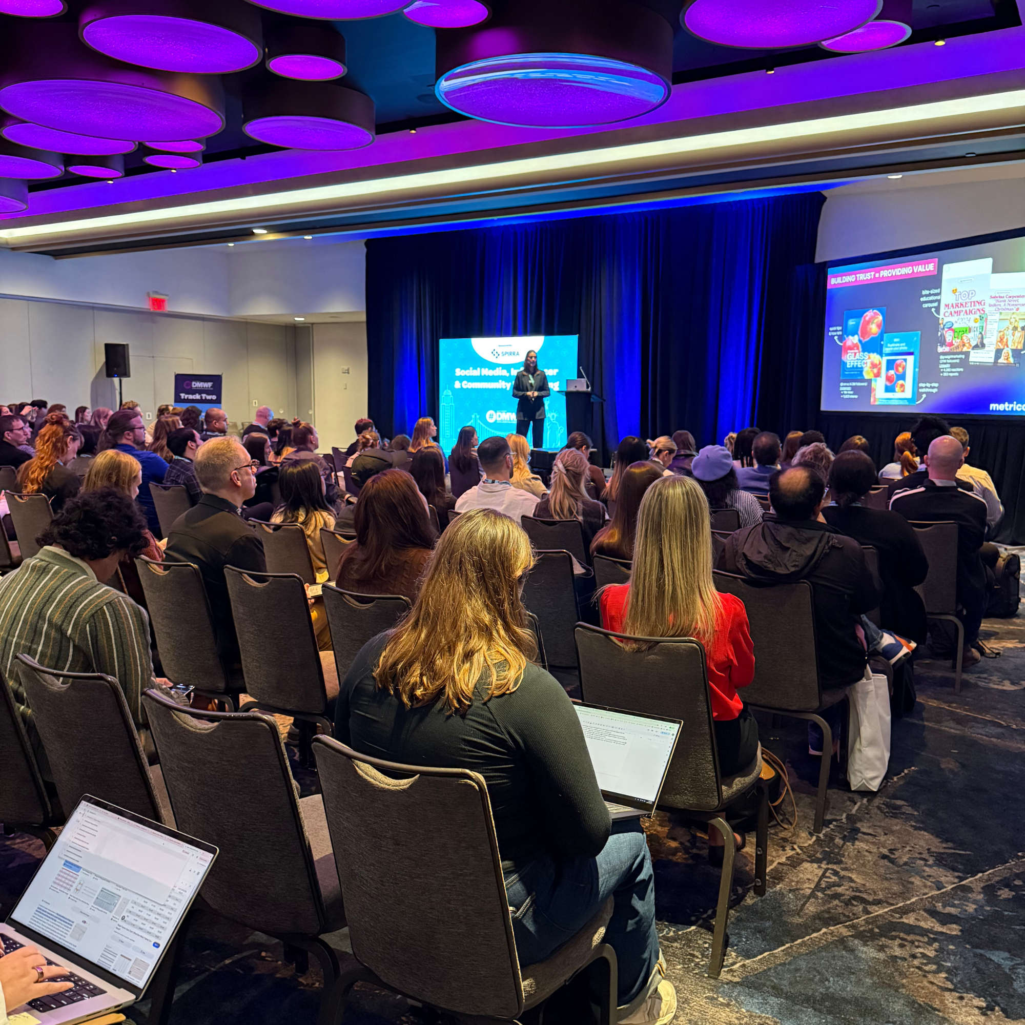 A keynote speaker in the conference room at DMWF 2025