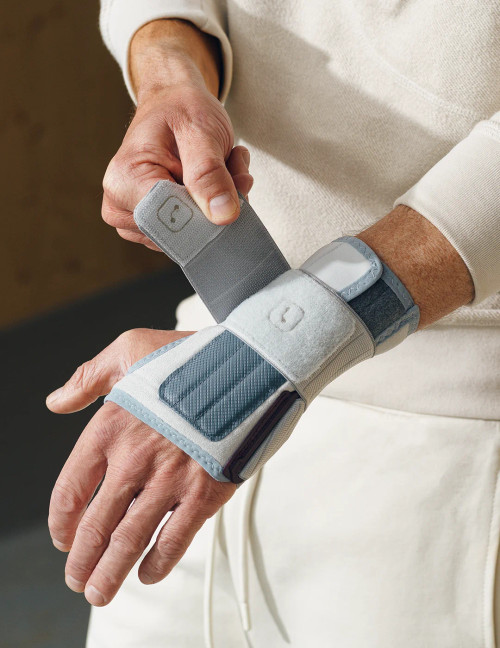 Interior view of wrist brace showing soft lining and ergonomic support panel for comfortable stabilisation.