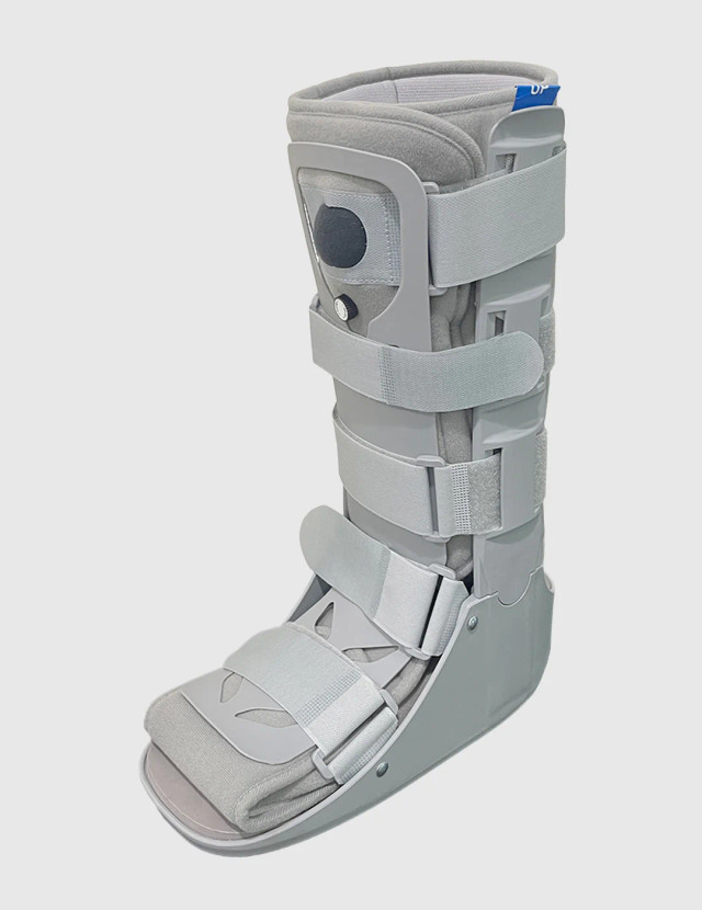 Ambidextrous air walker boot designed for controlled immobilisation following foot or ankle injury